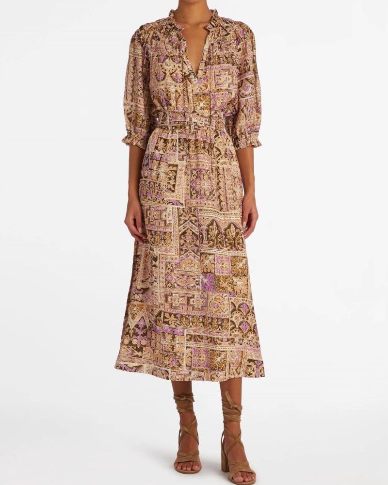 Front of a model wearing a size L Estine Wrap Skirt in Amethyst Tile in Amethyst Tile by Marie Oliver. | dia_product_style_image_id:339375